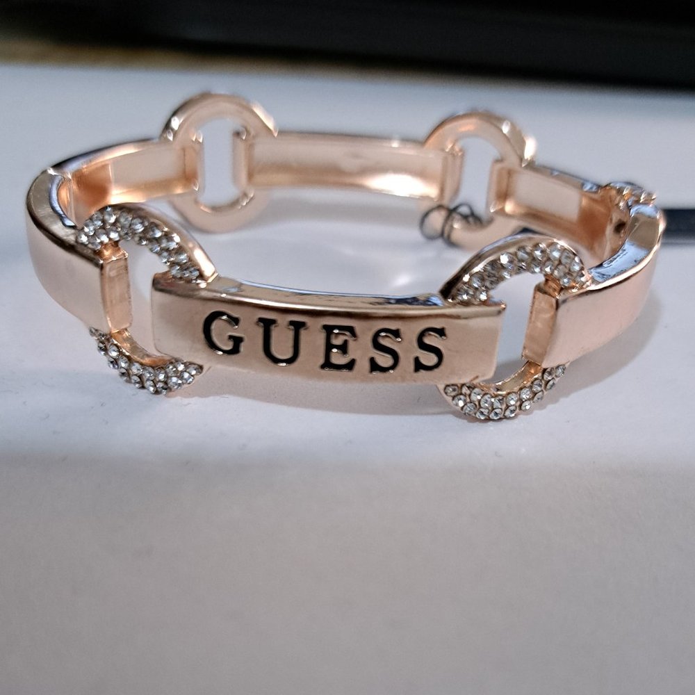 GUESS Women's rose Gold-Tone Pave Logo Bangle bracelet